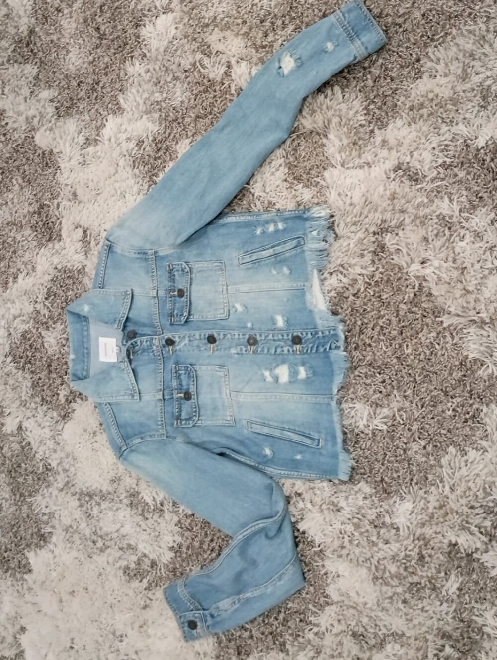 Women's Light Blue Distressed Denim Jacket with Frayed Hem